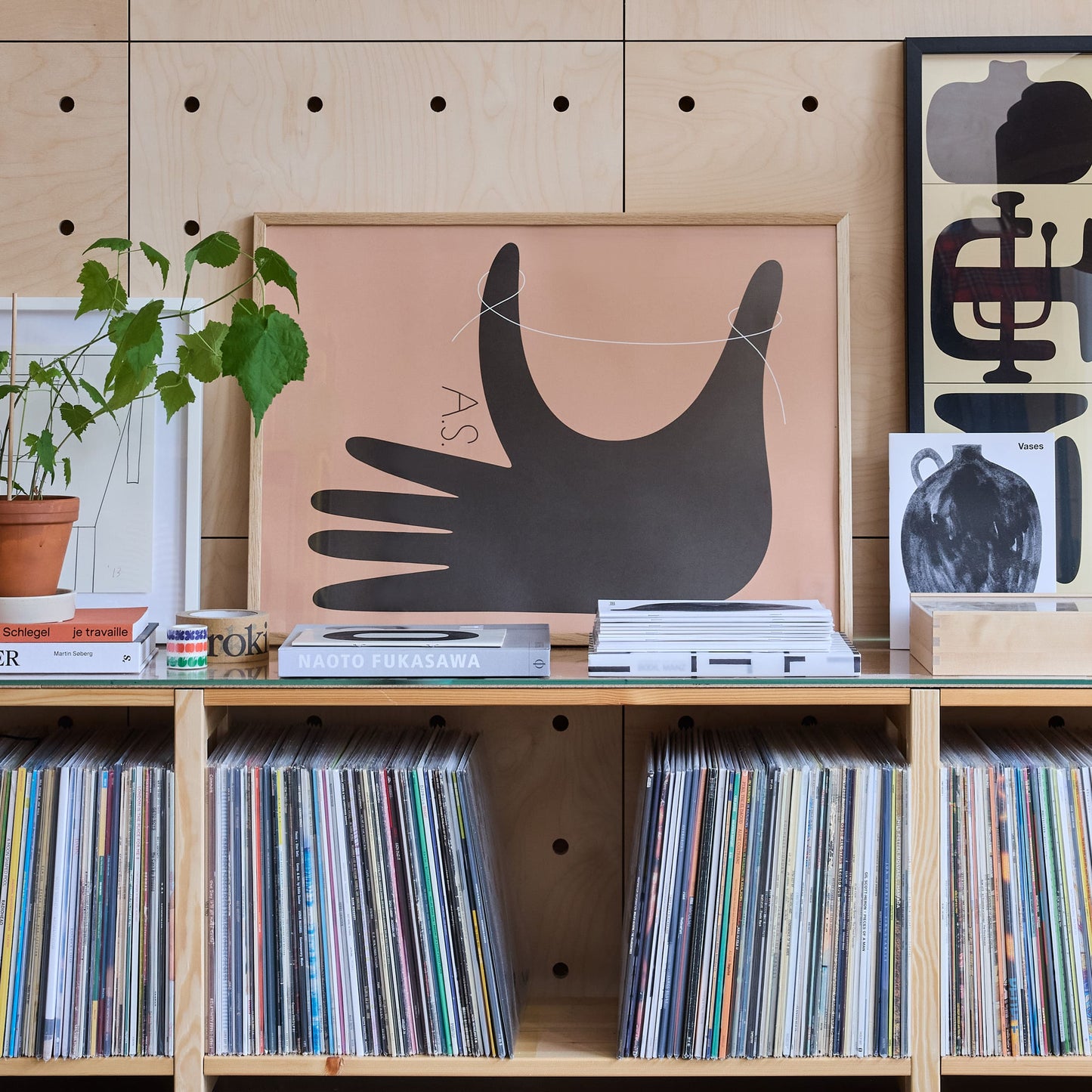 Between thumb & index finger